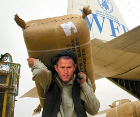 Bush helps unload U.N. World Food Programme supplies during a 1998 relief mission in Uzbekistan.